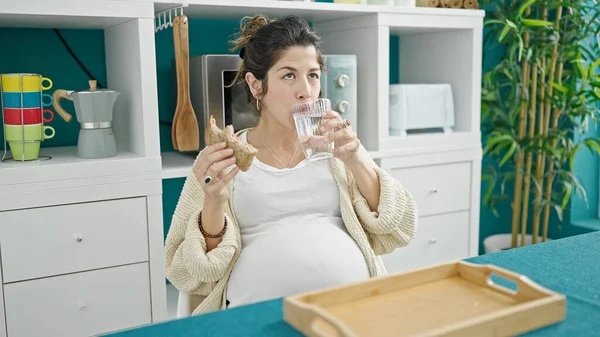 Young Pregnant Woman Eating Sandwich Drinking Water Dinning Room — Stock Photo, Image