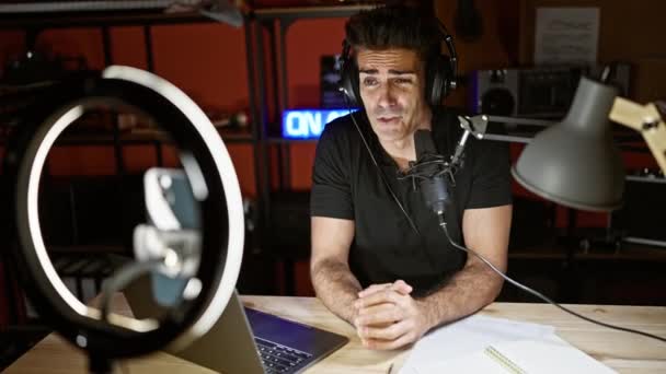 Young Hispanic Man Speaking Radio Show Recording Video Smartphone Radio — Stock Video