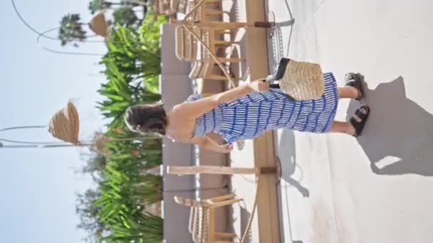 Young Hispanic Woman Spinning Herself Happy Sunny Restaurant Terrace — Stock Video