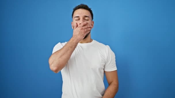 Young Arab Man Yawning Tired Isolated Blue Background — Stock Video