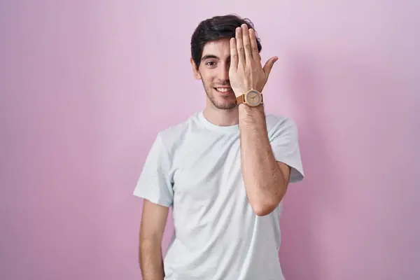 Young Hispanic Man Standing Pink Background Covering One Eye Hand —  Fotos de Stock