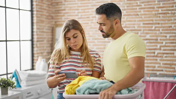 Man Woman Couple Holding Basket Clothes Using Smartphone Laundry Room — Stock Photo, Image