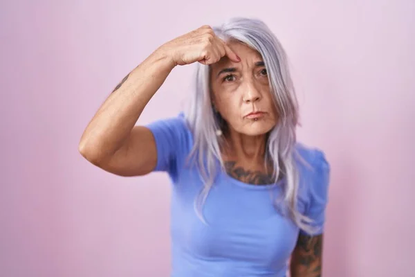 Middle Age Woman Tattoos Standing Pink Background Pointing Unhappy Pimple — Stock Photo, Image