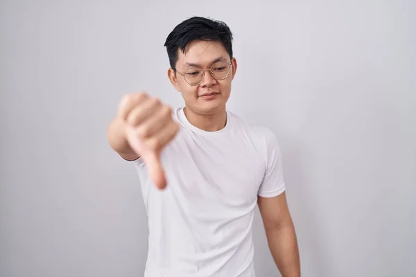 Young Asian Man Standing White Background Looking Unhappy Angry Showing — Stock Photo, Image