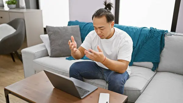 Handsome Young Chinese Man Focused Concentrated Working Online Using Laptop — Stock Photo, Image