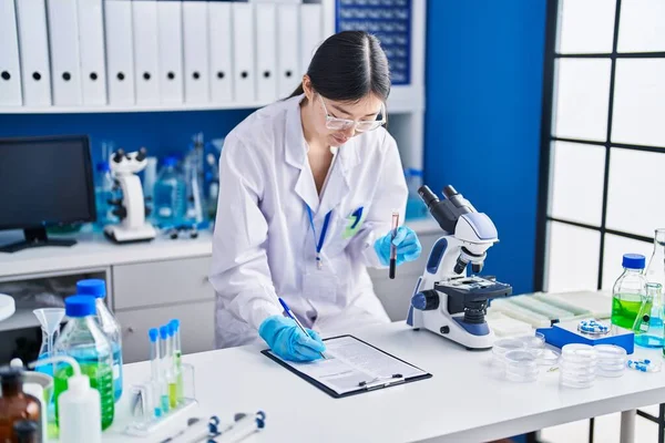 Chinese Woman Scientist Writing Document Holding Blood Test Tube Laboratory — Stock Photo, Image