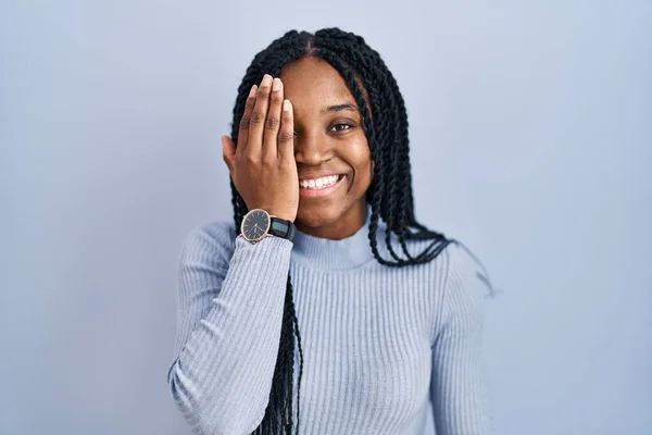 African American Woman Standing Blue Background Covering One Eye Hand — Stock Photo, Image