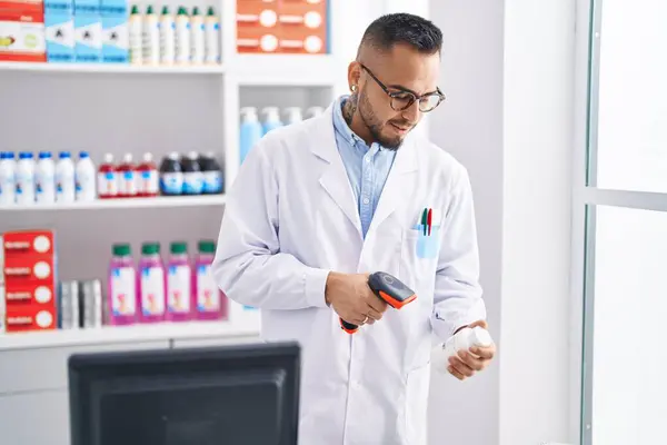 Young Hispanic Man Pharmacist Scanning Pills Bottle Pharmacy — Stock Photo, Image