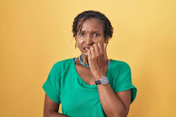 African Woman Dreadlocks Standing Yellow Background Looking Stressed Nervous Hands — Stock Photo, Image