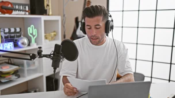 Stressed Young Hispanic Radio Reporter Struggles Taking Headphones Studio While — Stock Video