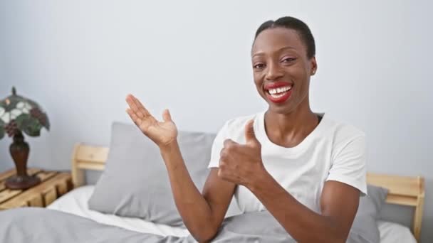 African American Woman Lying Bed Showing Palm Hand Doing Gesture — Stock Video