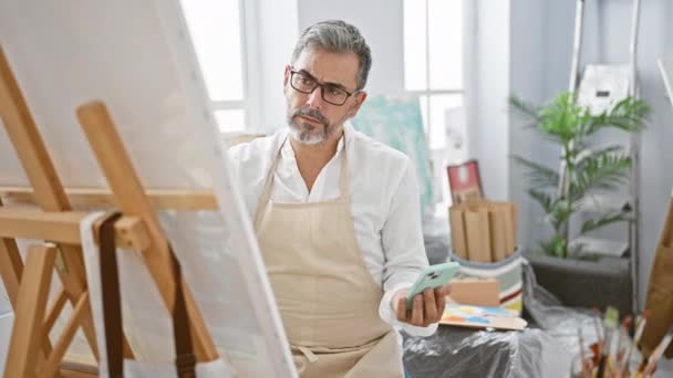 Attractive Young Hispanic Man Grey Haired Artist Engrossed Drawing Smartphone — Stock Video