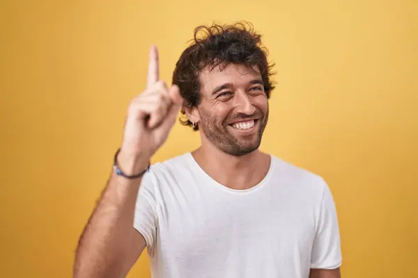 Young Hispanic Man Smiling Confident Doing Idea Gesture Finger Isolated — Stockfoto