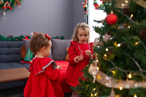 Adorable Girls Decorating Christmas Tree Home — Stock Photo, Image