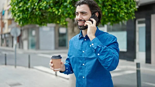 Young Hispanic Man Talking Smartphone Drinking Coffee Street — Foto de Stock