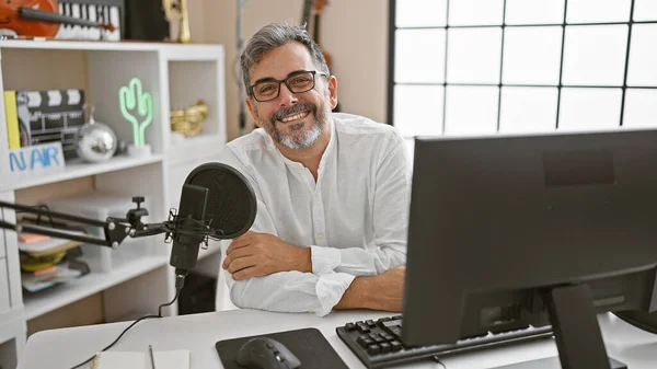 Young Attractive Grey Haired Hispanic Man Smiling Masterfully Presenting News — Stock Photo, Image