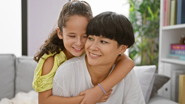 Confident Mother Daughter Sharing Joyful Hug Smiling Heartily While Sitting — Stock Photo, Image