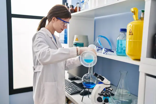 Young Blonde Woman Scientist Pouring Liquid Test Tube Laboratory — Stock Photo, Image