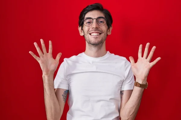 Young Hispanic Man Standing Red Background Celebrating Crazy Amazed Success —  Fotos de Stock