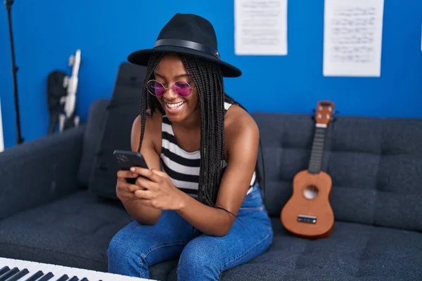 African American Woman Musician Smiling Confident Using Smartphone Music Studio — Stock Photo, Image
