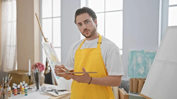 Young Hispanic Man Artist Holding Paintbrush Palette Art Studio — Photo