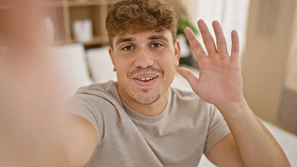 Young Hispanic Man Doing Video Call Sitting Bed Bedroom — Stock Photo, Image