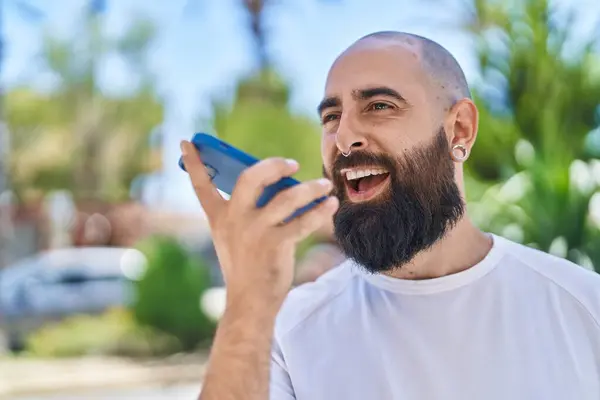 Young Bald Man Smiling Confident Talking Smartphone Park —  Fotos de Stock