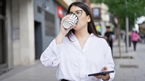 Young Beautiful Hispanic Woman Drinking Take Away Coffee Streets Madrid — Stock Video