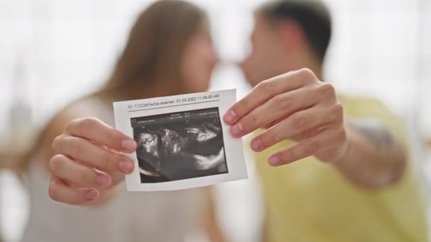 Beautiful Couple Sitting Bed Holding Baby Ultrasound Kissing Bedroom — Stock Video