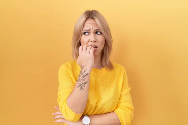 Young Caucasian Woman Wearing Yellow Sweater Looking Stressed Nervous Hands — Stock Photo, Image