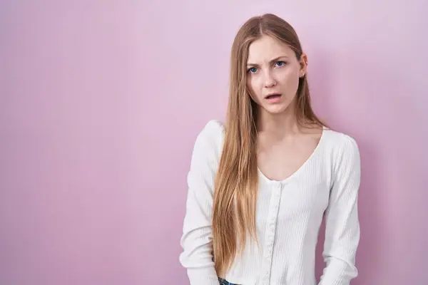Young Caucasian Woman Standing Pink Background Shock Face Looking Skeptical — Stock fotografie