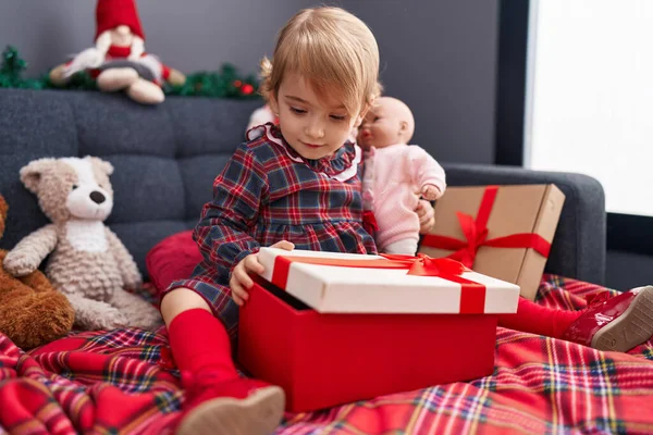 Adorable Caucasian Girl Unpacking Gift Sitting Sofa Christmas Tree Home — Stock Photo, Image