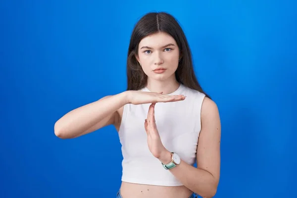 Young Caucasian Woman Standing Blue Background Doing Time Out Gesture — Stock Photo, Image