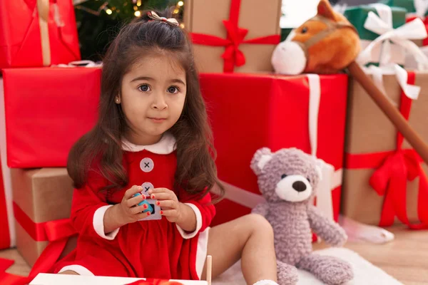 Adorable Hispanic Girl Sitting Floor Christmas Gifts Playing Home — Stock Photo, Image