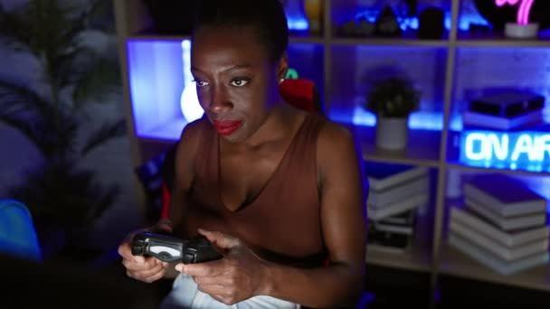 Cheerful African American Woman Gleefully Playing Video Games Confidently Pointing — Stock Video