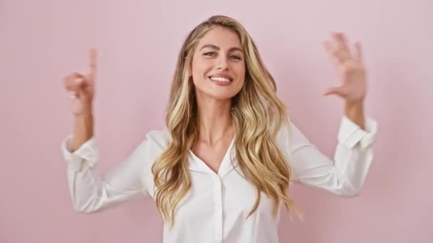 Cheerful Young Blonde Woman Pointing Upward Showing Number Six Fingers — Stock Video