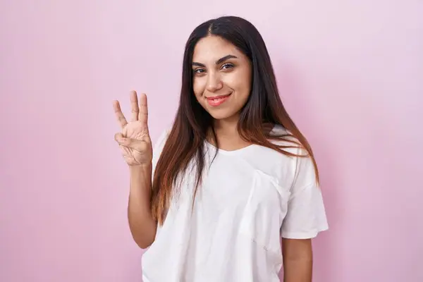 Young Arab Woman Standing Pink Background Showing Pointing Fingers Number — Stock Photo, Image