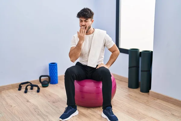 Hispanic Man Beard Sitting Pilate Balls Yoga Room Bored Yawning — Stock Photo, Image