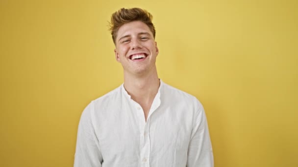 Laughing Confident Young Caucasian Man Casual Fashion Standing Isolated Yellow — Stock Video