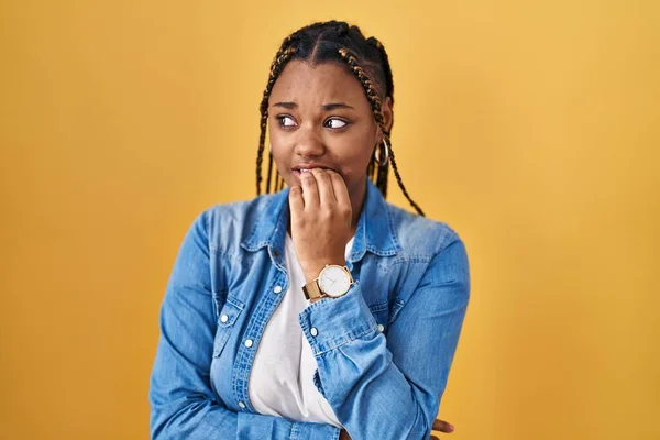 African American Woman Braids Standing Yellow Background Looking Stressed Nervous — Stock Photo, Image