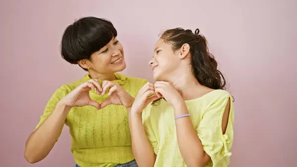 Confident Mother Daughter Make Heart Gesture Hands Smiling Isolated Pink — Stock Photo, Image