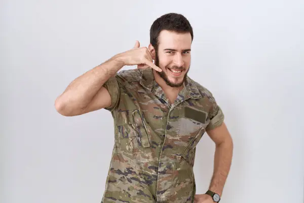 Young Hispanic Man Wearing Camouflage Army Uniform Smiling Doing Phone — Stock Photo, Image