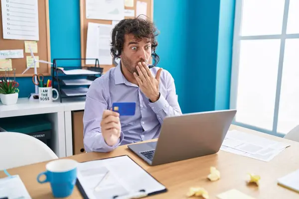 Hispanic Young Man Working Office Doing Online Shopping Covering Mouth — Stock Photo, Image