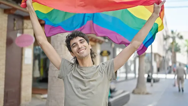 Young Hispanic Man Smiling Confident Holding Rainbow Flag Street — Stock Photo, Image