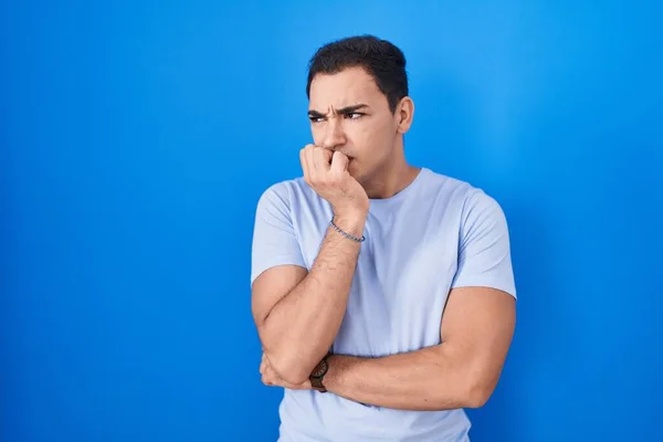 Young Hispanic Man Standing Blue Background Looking Stressed Nervous Hands — Stock Photo, Image