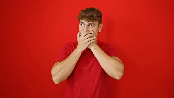 Handsome Young Hispanic Man Covers Mouth Hands Isolated Red Background — Stock Photo, Image
