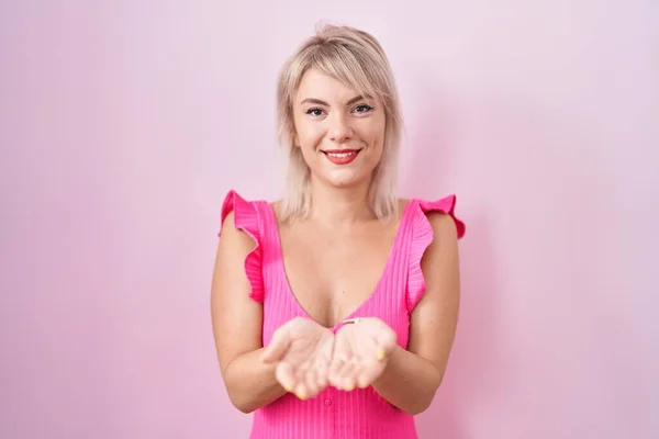 Young Caucasian Woman Standing Pink Background Smiling Hands Palms Together — Stock Photo, Image
