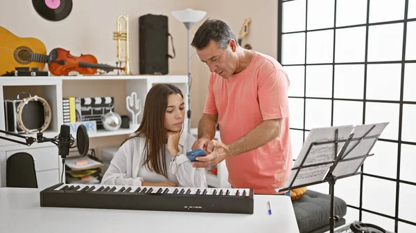 Passionate Hispanic Man Woman Musicians Engrossed Melodious Piano Lesson Together — Stock Photo, Image
