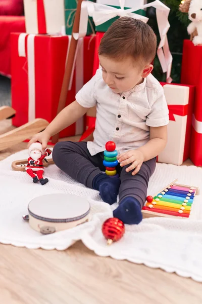 Adorable Hispanic Toddler Playing Toys Sitting Floor Christmas Gifts Home — Stock Photo, Image
