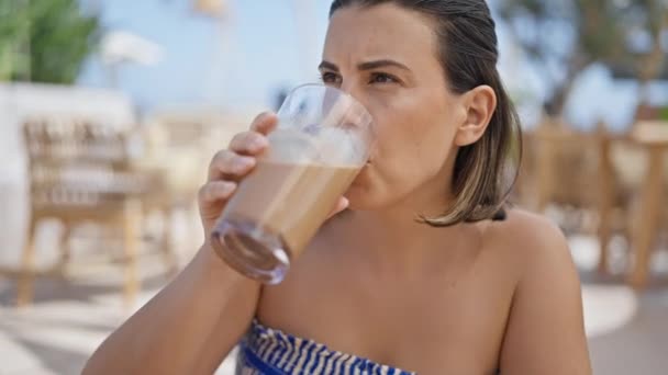 Young Hispanic Woman Drinking Iced Coffee Sunny Restaurant Terrace — Stock Video